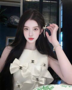 QiuQiu China Escort KL white dress posing indoors